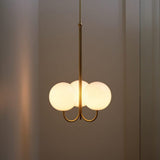 mid-century-modern-triple-angle-brass-pendant-lamp-with-opal-glass-globe-shade