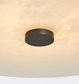 Modern Alabaster Flush Mount Ceiling Light with Brass Accents and Handcrafted Stone Shade