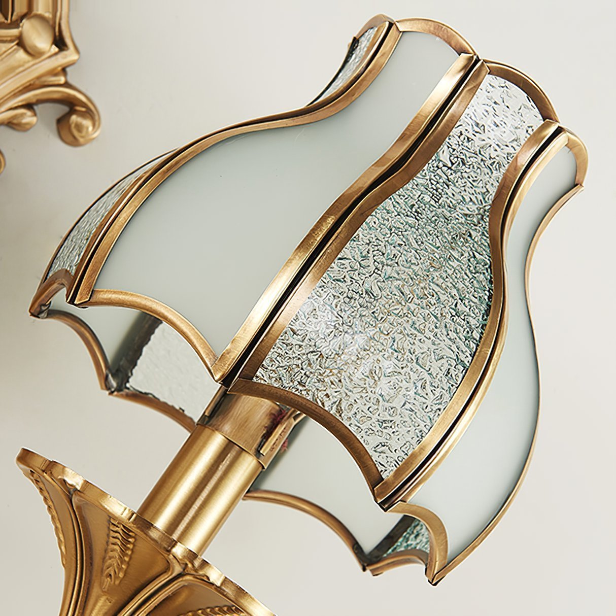 elegant-brass-and-white-glass-wall-sconce-light-fixture-for-modern-interior-spaces