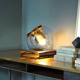 Modern Glass Globe Table Lamp with Gold Metal Base for Bedside Lighting