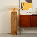 Rustic Wood Floor Lamp with Organic Texture and Beige Fabric Shade Standing Reading Light