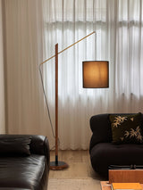 archer-contemporary-arched-wood-standing-lamp-with-adjustable-linen-drum-shade