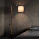 archer-contemporary-arched-wood-standing-lamp-with-adjustable-linen-drum-shade