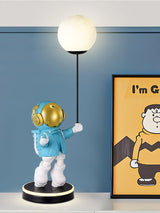 Creative Astronaut Planet Resin Table Lamp Modern Sculptural Bedside Lighting for Kids Room