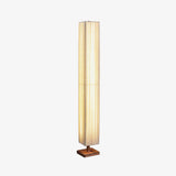elegant-minimalist-fabric-cylinder-standing-lamp-with-natural-wood-base