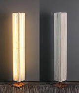 elegant-minimalist-fabric-cylinder-standing-lamp-with-natural-wood-base