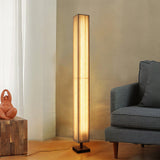 elegant-minimalist-fabric-cylinder-standing-lamp-with-natural-wood-base