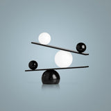 Modern Artistic Balance Table Lamp with Glass Spheres and Black Marble Base