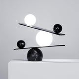 Modern Artistic Balance Table Lamp with Glass Spheres and Black Marble Base