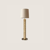 modern-stacked-wood-ring-floor-lamp-with-fabric-shade-and-metal-base