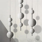 modern-glass-beads-pendant-light-with-opal-globe-shade-and-black-finish-led-chandelier