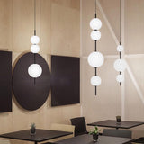 modern-glass-beads-pendant-light-with-opal-globe-shade-and-black-finish-led-chandelier