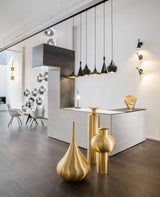 modern-beat-metal-wall-sconce-with-gold-interior-for-bedroom-and-living-room