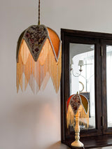 vintage-style-velvet-fringed-pendant-light-with-tassels-and-brass-details