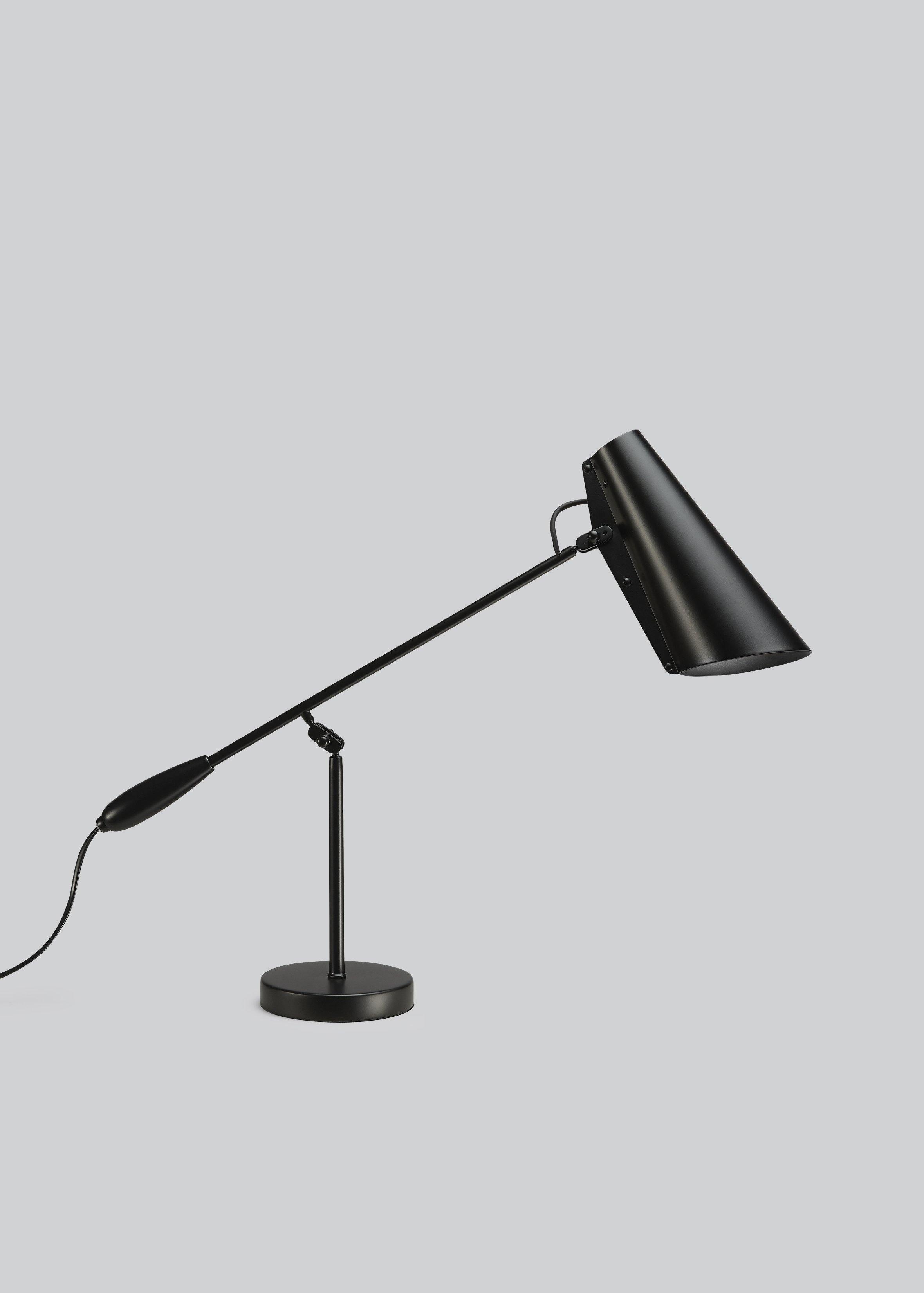 modern-birdy-table-lamp-with-adjustable-arm-and-minimalist-steel-design