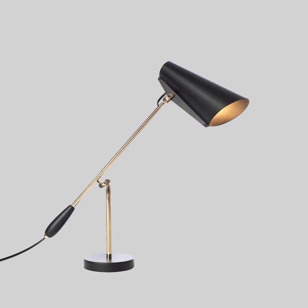 modern-birdy-table-lamp-with-adjustable-arm-and-minimalist-steel-design
