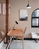 modern-birdy-table-lamp-with-adjustable-arm-and-minimalist-steel-design
