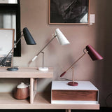 modern-birdy-table-lamp-with-adjustable-arm-and-minimalist-steel-design