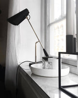 modern-birdy-table-lamp-with-adjustable-arm-and-minimalist-steel-design