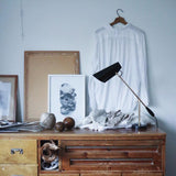 modern-birdy-table-lamp-with-adjustable-arm-and-minimalist-steel-design