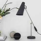 modern-birdy-table-lamp-with-adjustable-arm-and-minimalist-steel-design