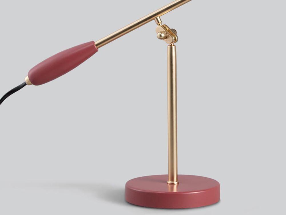 modern-birdy-table-lamp-with-adjustable-arm-and-minimalist-steel-design