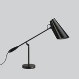 modern-birdy-table-lamp-with-adjustable-arm-and-minimalist-steel-design