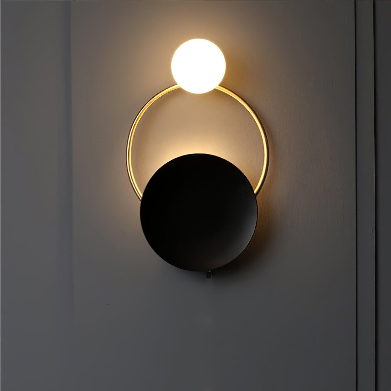 modern-geometric-black-and-gold-wall-sconce-with-white-glass-sphere-light-fixture