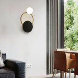 modern-geometric-black-and-gold-wall-sconce-with-white-glass-sphere-light-fixture