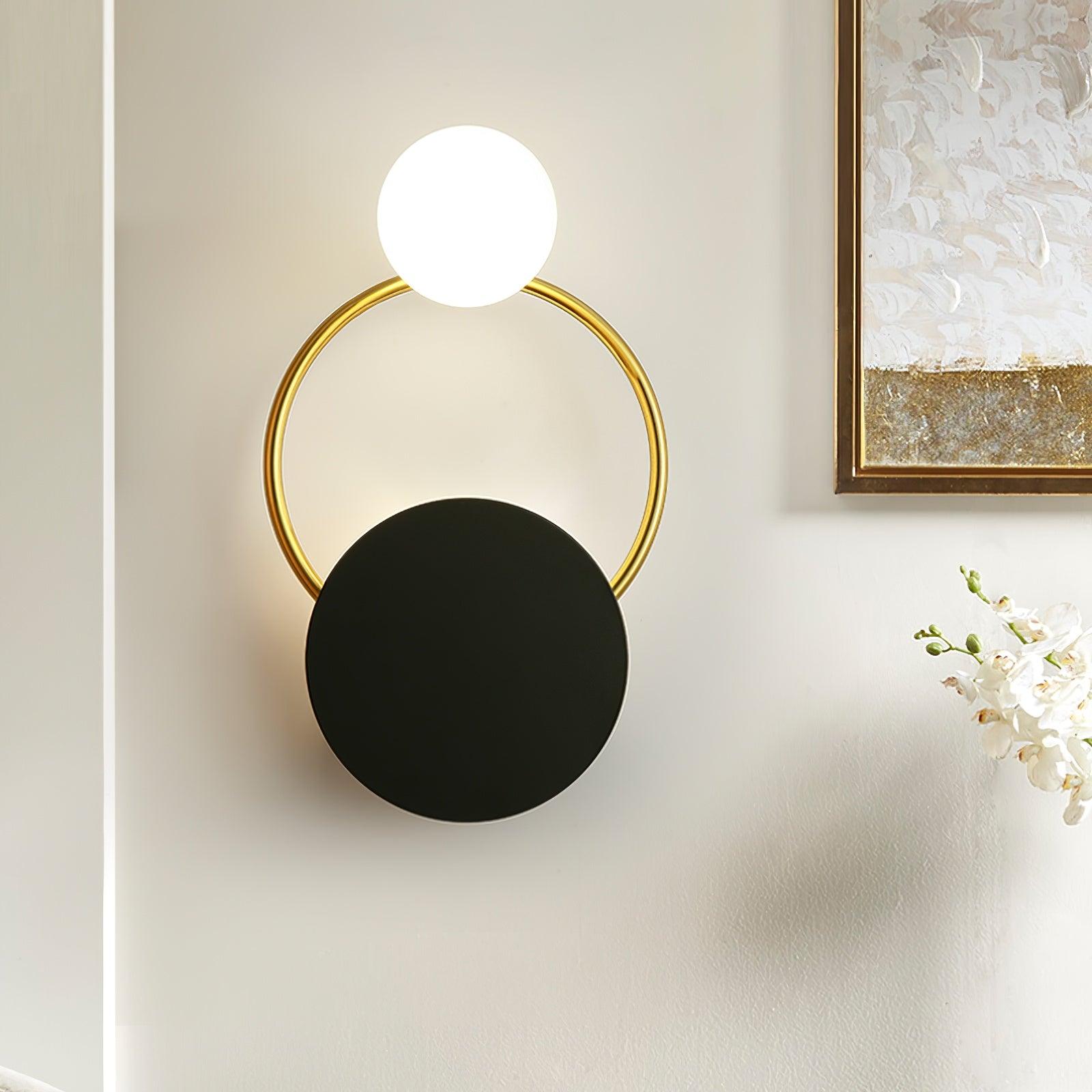modern-geometric-black-and-gold-wall-sconce-with-white-glass-sphere-light-fixture