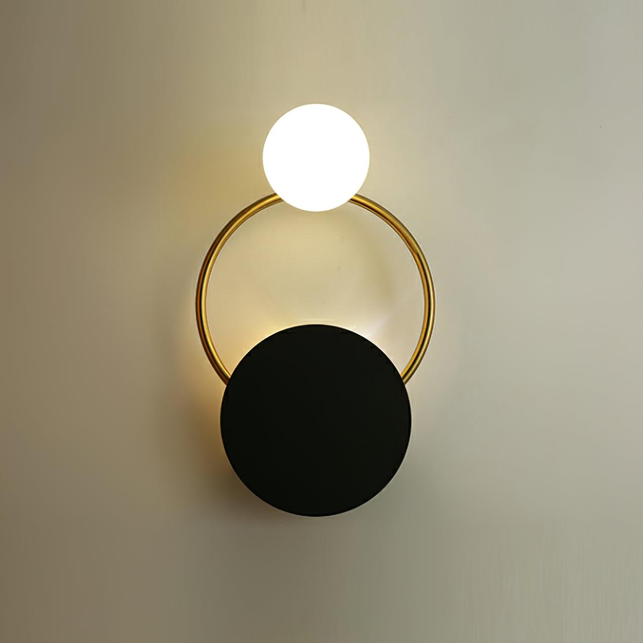 modern-geometric-black-and-gold-wall-sconce-with-white-glass-sphere-light-fixture