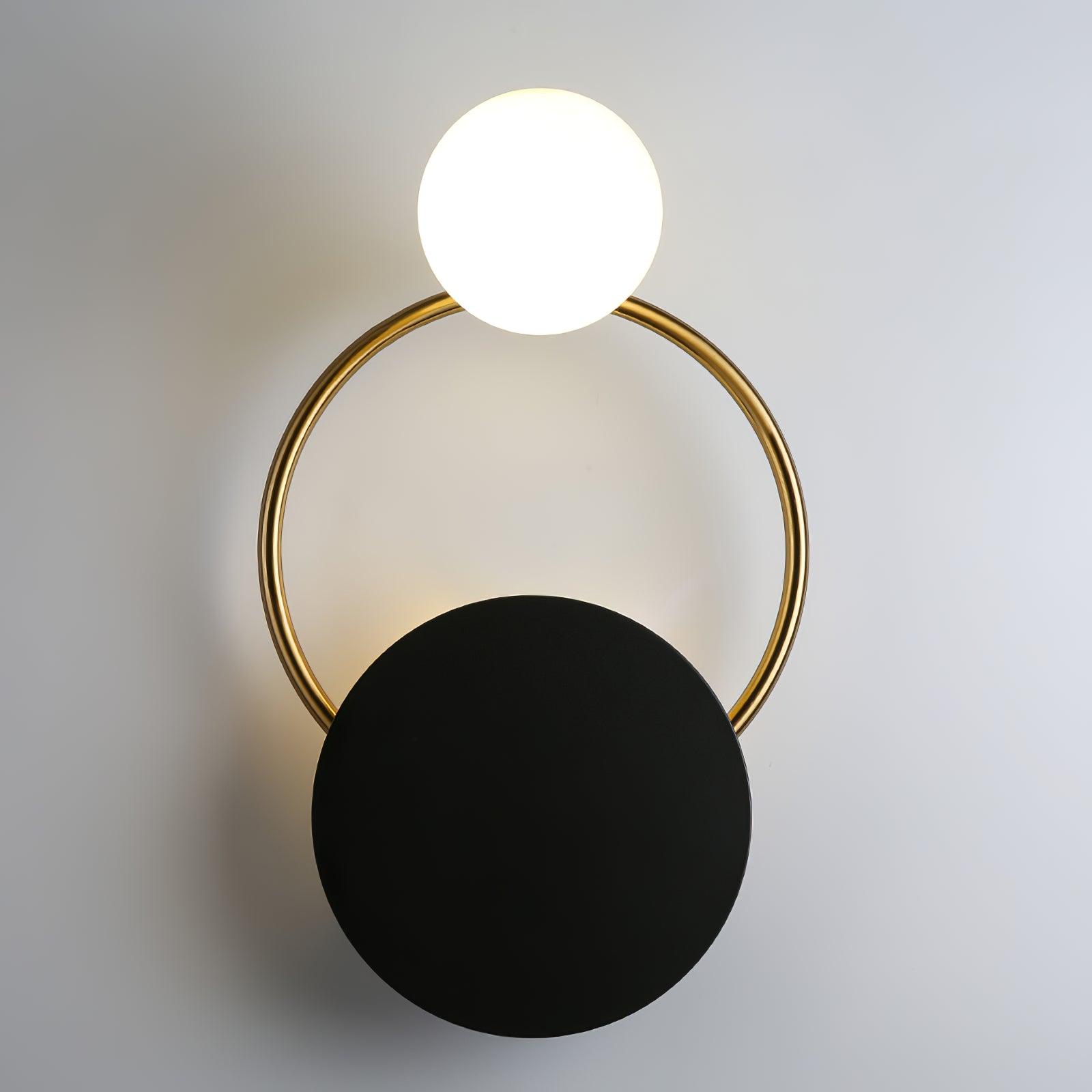 modern-geometric-black-and-gold-wall-sconce-with-white-glass-sphere-light-fixture