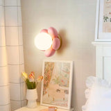 elegant-floral-wall-sconce-lighting-with-glass-shade-and-natural-wood-base