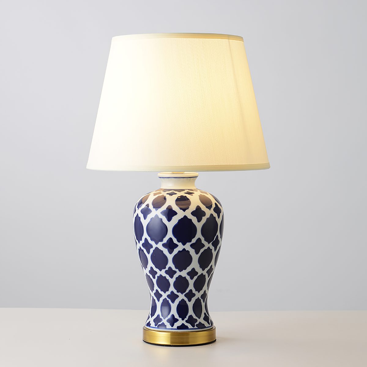 modern-blue-and-white-ceramic-table-lamp-with-fabric-shade-for-living-room-bedroom