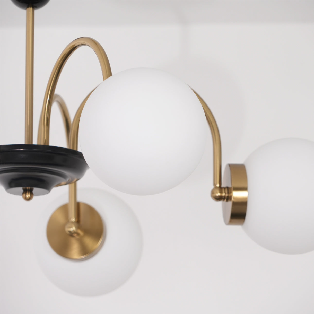 modern-mid-century-glass-globe-chandelier-with-metal-rod-frame-and-white-opal-shades