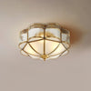 Elegant Brass Domed Flush Mount Ceiling Light with White Frosted Glass Panel