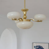 elegant-brass-and-cream-glass-orb-chandelier-mid-century-modern-pendant-light