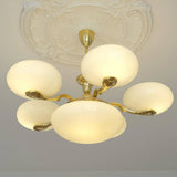 elegant-brass-and-cream-glass-orb-chandelier-mid-century-modern-pendant-light