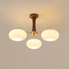 mid-century-modern-brass-and-wooden-persimmon-chandelier-glass-pendant-light
