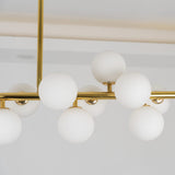 modern-glass-sphere-bubble-stick-chandelier-gold-metal-pendant-light-for-living-room