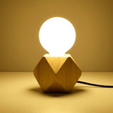 handcrafted-ash-wood-table-lamp-with-white-glass-globe-for-modern-bedside-lighting