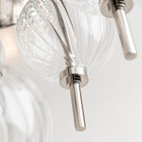 modern-calypso-glass-sphere-chandelier-with-fluted-spiral-design-for-living-room-and-dining-areas