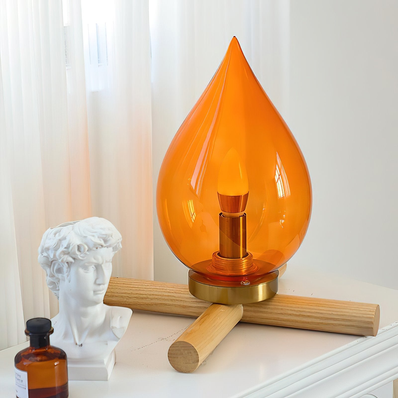 mid-century-campfire-table-lamp-with-orange-glass-shade-and-natural-wood-base