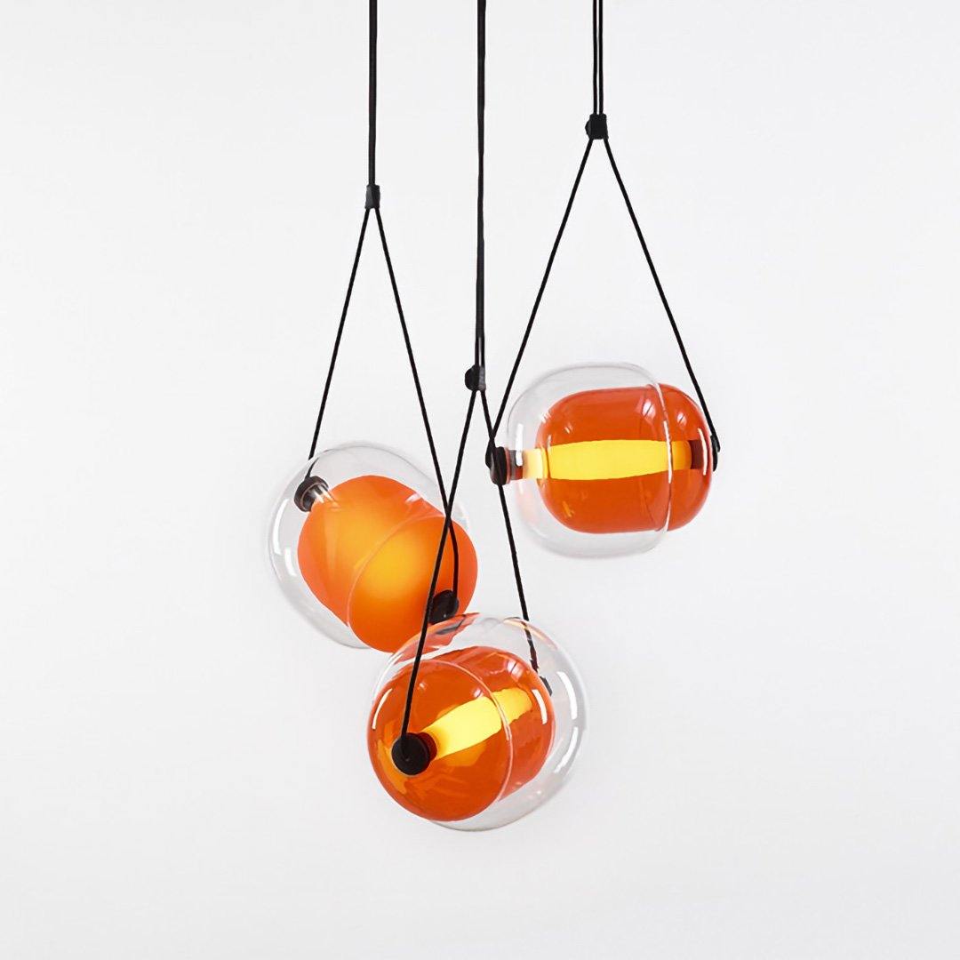 modern-capsula-layered-glass-led-pendant-light-for-contemporary-interior-lighting