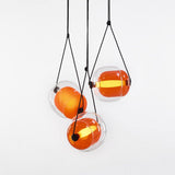 modern-capsula-layered-glass-led-pendant-light-for-contemporary-interior-lighting