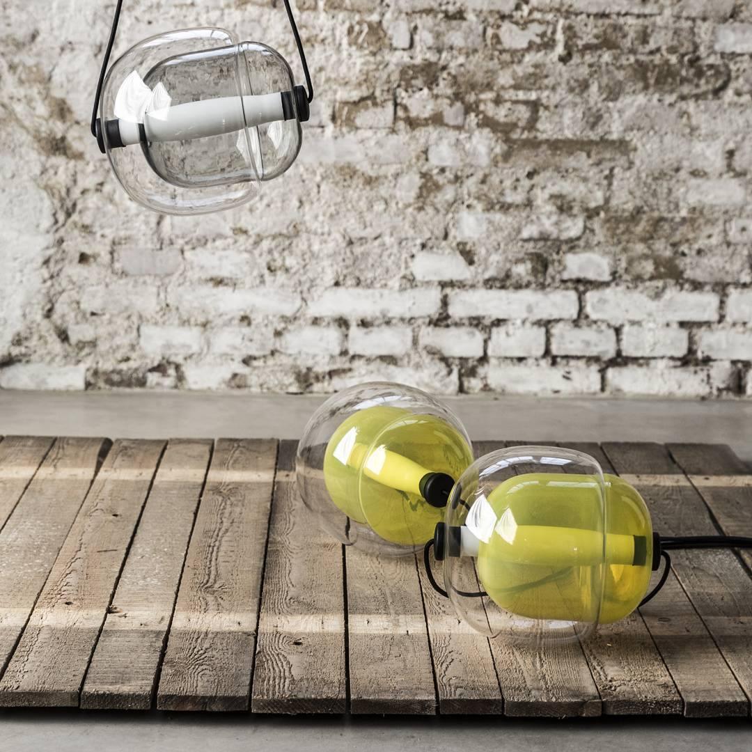 modern-capsula-layered-glass-led-pendant-light-for-contemporary-interior-lighting