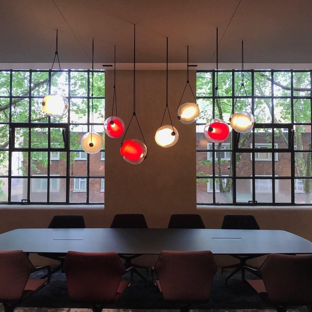 modern-capsula-layered-glass-led-pendant-light-for-contemporary-interior-lighting