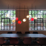 modern-capsula-layered-glass-led-pendant-light-for-contemporary-interior-lighting