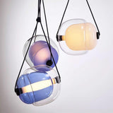 modern-capsula-layered-glass-led-pendant-light-for-contemporary-interior-lighting
