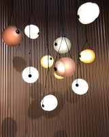 modern-capsula-layered-glass-led-pendant-light-for-contemporary-interior-lighting